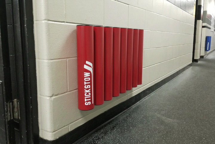 Red eight-tube hockey stick rack