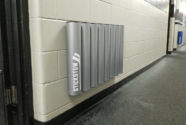 Silver eight-tube hockey stick rack